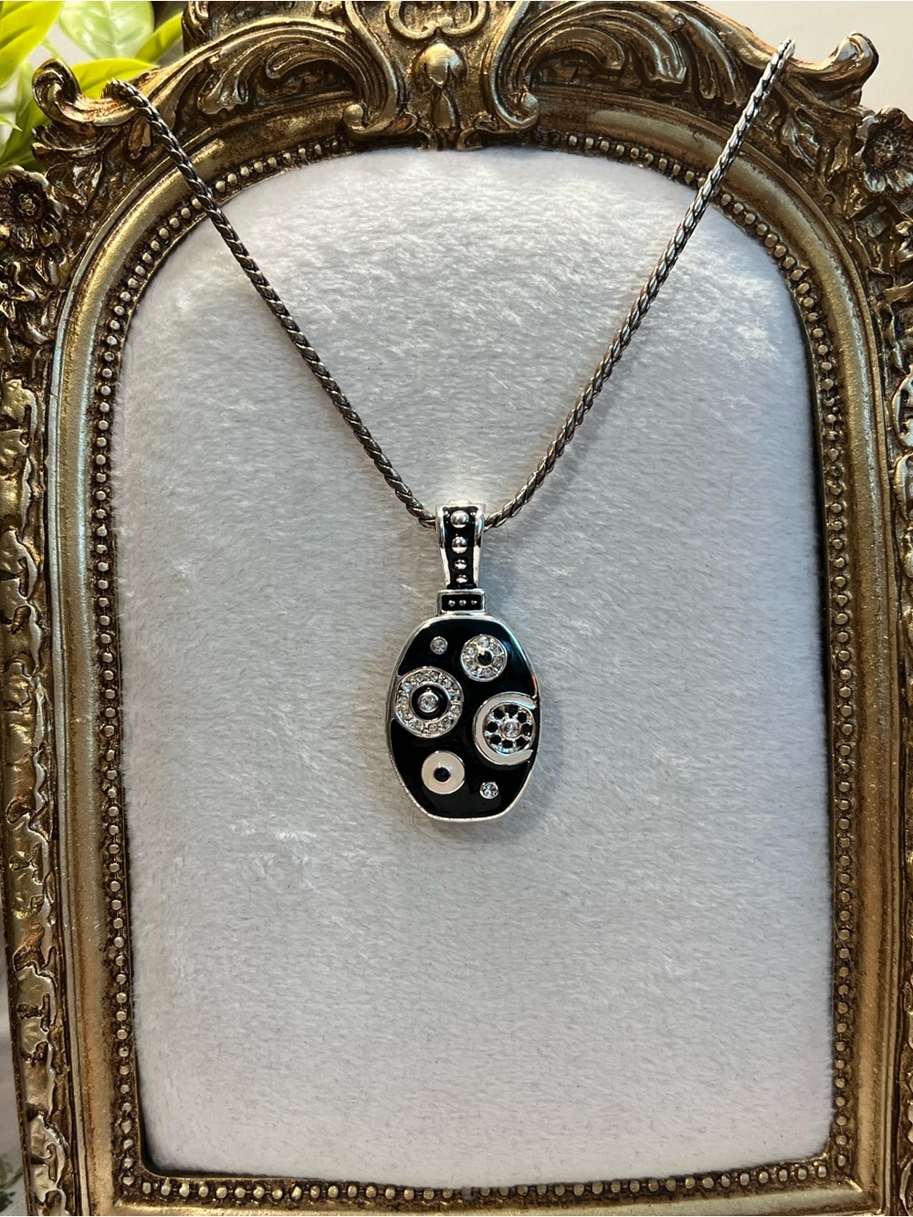 Silver-Tone Black Oval Pendant Necklace with Crystal Accents